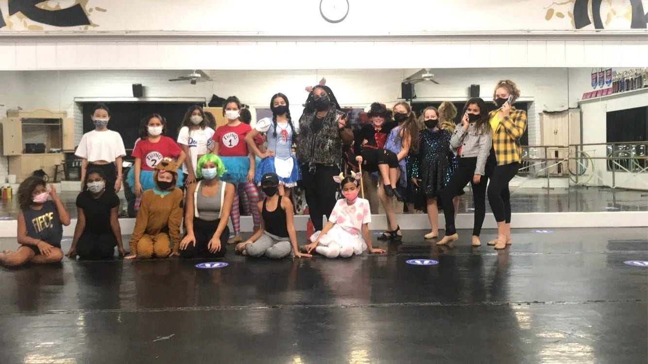 Our dancers in costume together on the studio floor.